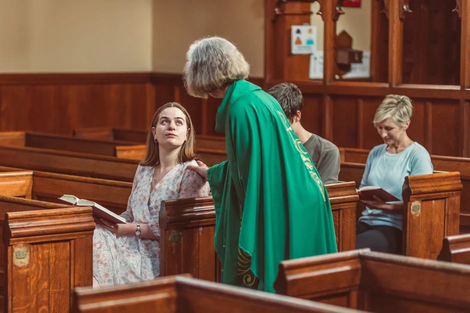 compassionate pastor listening to congregant